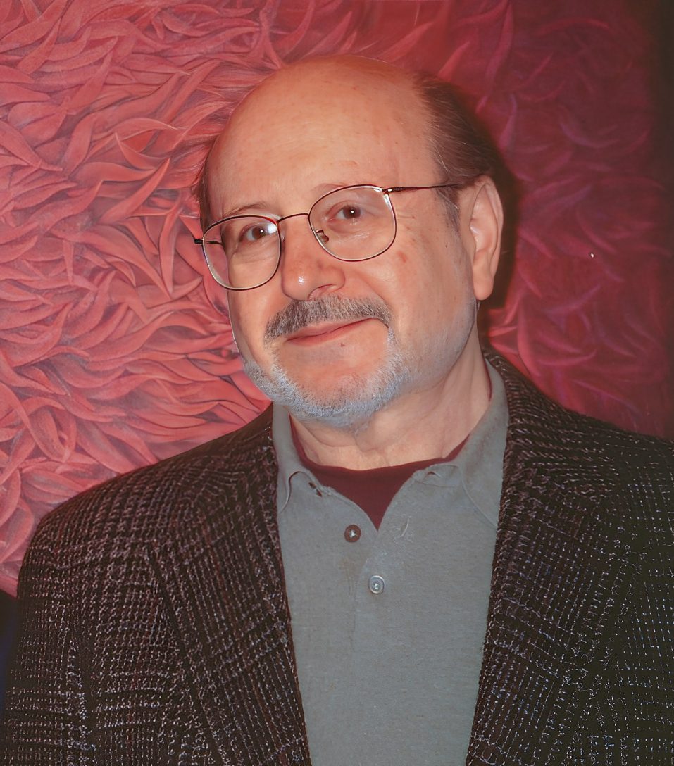 Man with glasses against textured red background. Man with glasses against textured red background.